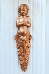 Antique decorative sculpture symbolizing humility.