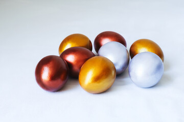 Easter background with Easter eggs on white background. Spring holiday. Top view, Flatlay