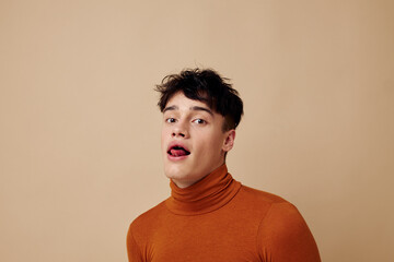 Obraz premium handsome guy posing in brown sweater self confidence fashion Lifestyle unaltered