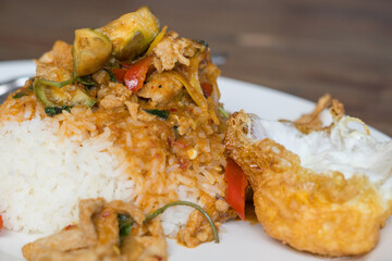 Stir Fried Pork in Red Curry Paste with Rice and Fried Egg - Local Asian Food