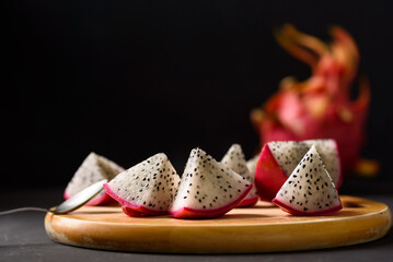 Dragon fruit from local market on black background, Tropical fruit in spring and summer season