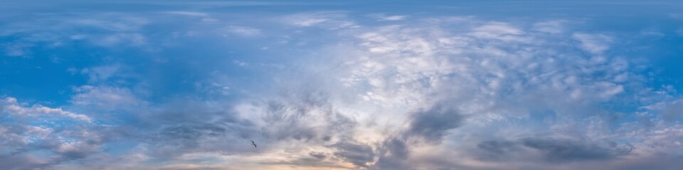 Blue sky panorama with Cirrus clouds in Seamless spherical equirectangular format. Full zenith for use in 3D graphics, game and editing aerial drone 360 degree panoramas for sky replacement.