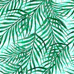 Palm leaves seamless pattern on blue watercolor background 