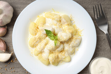 Concept of tasty food with potato gnocchi, top view