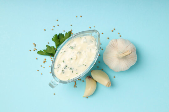 Concept of tasty food with garlic sauce, top view