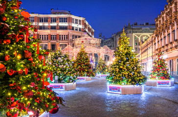 Christmas trees in toys on the Kuznetsky bridge near the Central Department Store in Moscow in the...