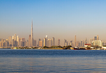 Fototapeta na wymiar Dubai, UAE - 02.11.2022 - View of Dubai skyline, shot made from Dubai creek harbor. City