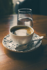 a cup of aromatic coffee on the table, black coffee Americano