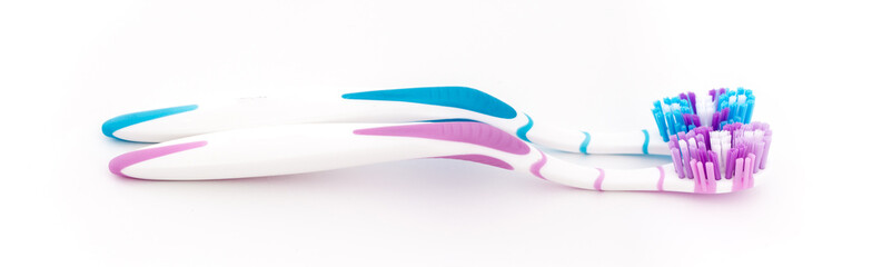 Toothbrushes on a white background. Oral hygiene. Male and female couple, family hygiene and relationships.