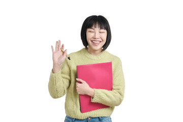 Naklejka premium Young asian student woman smiling and waving hand with her eyes closed, wearing winter green sweater, isolated on white background.