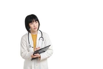 Fototapeta premium Young asian female doctor listening and writing on a paper, isolated on white background.