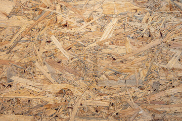 osb plate. osb panel. pressed wood shavings. osb plate texture.