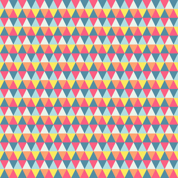 Seamless vector pattern. Abstract geometric background of triangles in in red, blue, orange, yellow tone. For use on wallpaper, fabric, packaging and more.