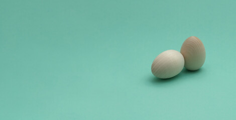 Two wooden eggs. Easter concept. Copy space. Banner