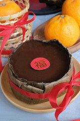 Chinese New Year must have food item. Nian Gao aka New Year Cake. The Chinese character is "fook or fortune"