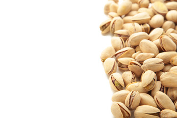 Pile of Pistachios isolated on white background.