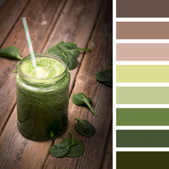 Green smoothie with spinach over old wood background, in a colour palette with complimentary colour swatches.