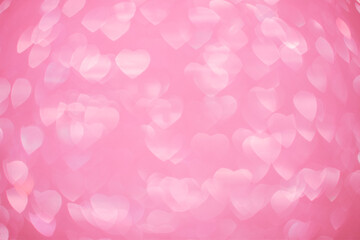 Background bokeh in the form of hearts of red and pink color. Copy space for text. The concept of romance and love. Valentine's Day. Shiny texture background. Festive background.
