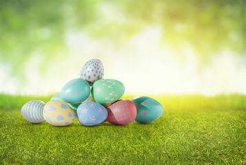 Easter eggs is on Fresh Green Grass against blurred nature background 3D rendering