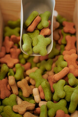 Close up view of natural colorful dog treats in bulk