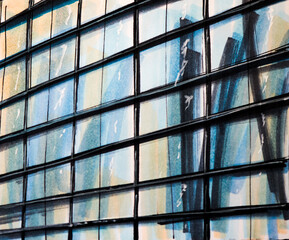 Abstract architectur sketch of office building with glass front and window reflections. Illustration.