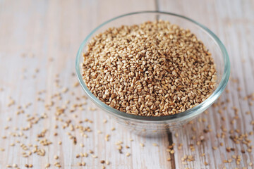 Sesame seeds in a small glass bowl