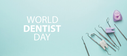 Dentist's tools and teeth on color background. World Dentist Day