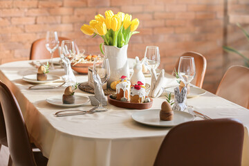 Table set for Easter celebration in room