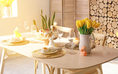 Interior of room with table set for Easter celebration