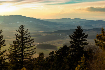 Evening landscape in South Czechia. View from Kluk mount. Early spring. - obrazy, fototapety, plakaty