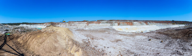 Quarry extraction porcelain clay(kaolin) and quartz sand in the open pit mine.