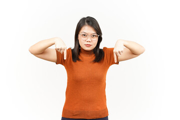 Showing Product and Pointing Down Of Beautiful Asian Woman Isolated On White Background