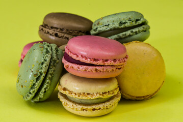 Den Helder, the Netherlands. January 2022. A stack of macarons on an yellow background.