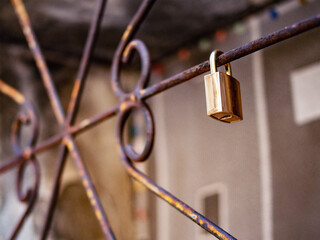 love lock on an old rusty lattice
