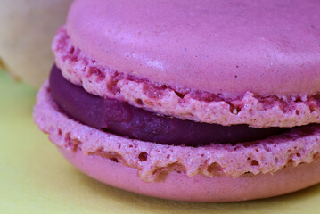 Den Helder, the Netherlands. January 2022. A stack of macarons on an yellow background.