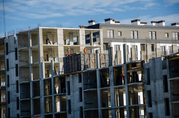 builders at the construction site. assembly work. pouring concrete on the construction of high-rise buildings