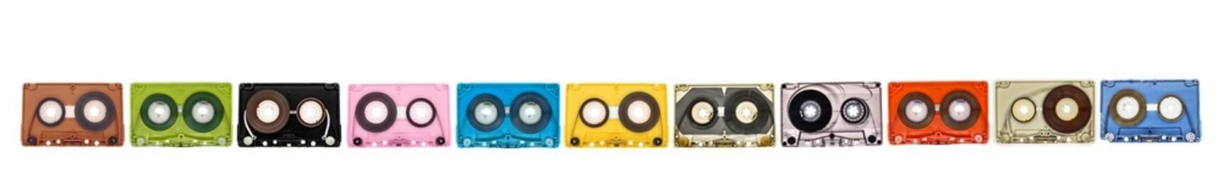 old audio cassette tape open in a row on white background, banner design with copy space