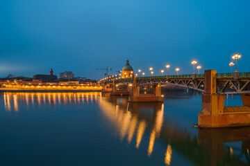 Garonne river and Dome of the 'Hopital de la Grave' at dusk in Toulouse, France