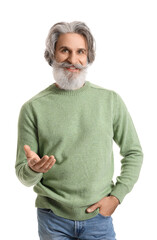 Handsome senior man in knitted sweater on white background