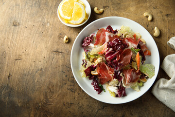 Leaf salad with smoked meat