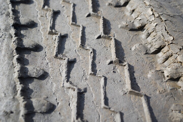 Tire track on the ground . close up view