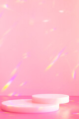 Abstract minimal scene - empty stage, cylinder podiums on soft pink background with rainbow crystal light refraction sparkles. Pedestal for cosmetic product and packaging mockups display presentation