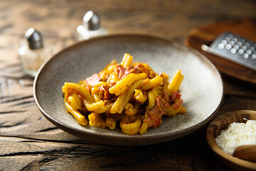 Pasta with pastrami and cheese