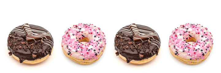 donut with white and pink chocolate icing and berries and donut wrapped in dark chocolate with...