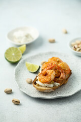 Shrimp toast with cream cheese and lime