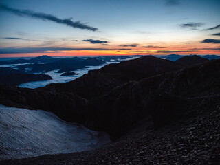 Dawn above the clouds in Austrian mountains