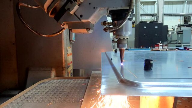 5-axis Robot Arm used to for Laser cutting stamped part for prototype vehicle - Filmed in 4K