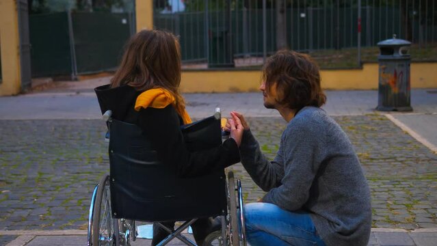living with disability - woman using wheelchair breaks up with her boyfriend