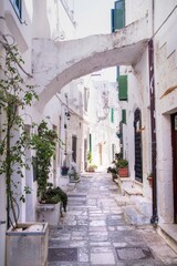 Fototapeta na wymiar The white streets of Ostuni in Salento Puglia
