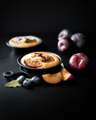 Fruit pie with plums and blueberries
